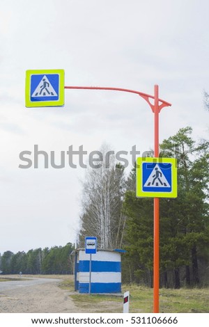 Road sign "Pedestrian crossing" on a country road