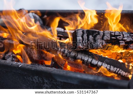 the fire in the grill Royalty-Free Stock Photo #531147367