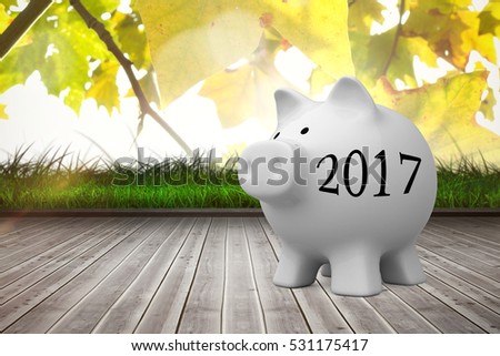 Digital image of new year 2017 against leaves against wooden planks