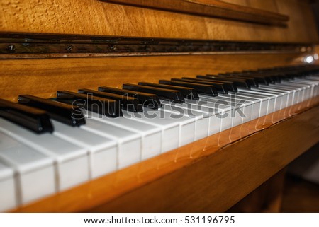 piano keys for begraund, with a selective focus