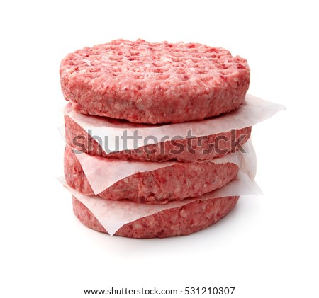 Stack of fresh raw burger patty isolated on white Royalty-Free Stock Photo #531210307