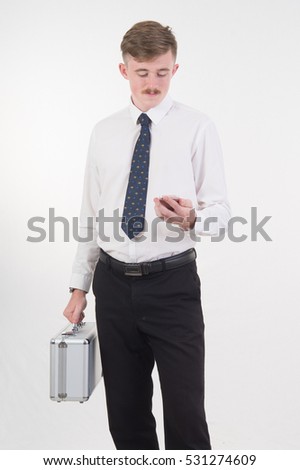 a Business man holding  bag and smatphone on white background
