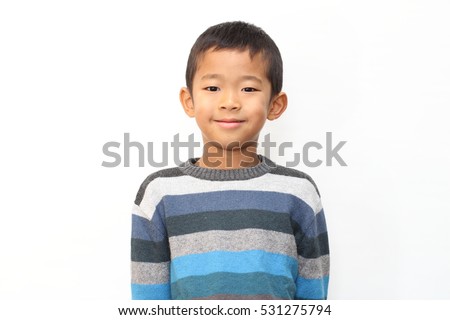 Smiling Japanese boy (first grade at elementary school) Royalty-Free Stock Photo #531275794