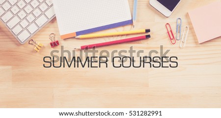 SUMMER COURSES Concept on Wooden Background
