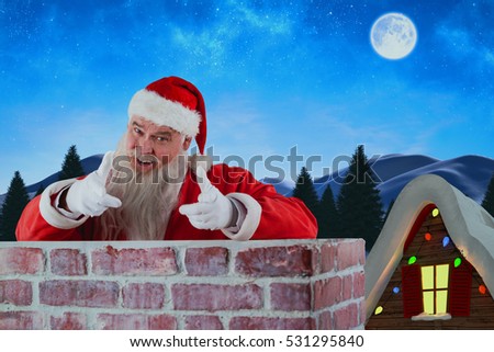 Portrait of happy Santa Claus making hand gesture over wall against winter snow scene