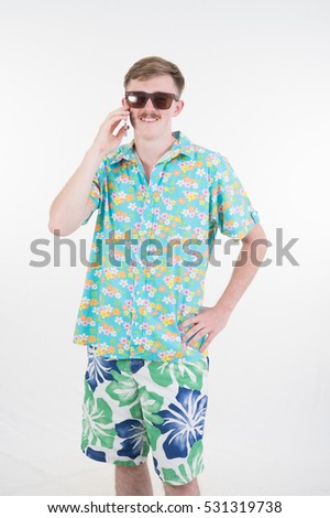 an attractive male in  colorful call phone posing on white background
