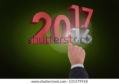 Businessman touching invisible screen against green background with vignette