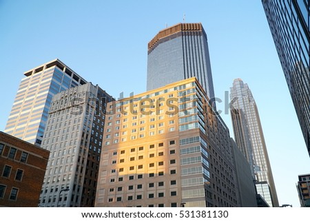 Look up view at downtown Minneapolis Minnesota skyscrapers. Center location for banking institution headquarters in north midwest