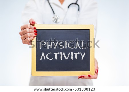 Physical Activity Chalkboard Sign Held By Female Doctor.