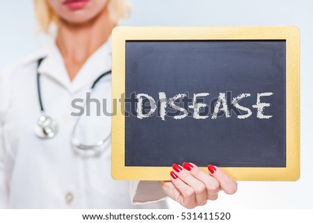 Disease Chalkboard Sign Held By Female Doctor.