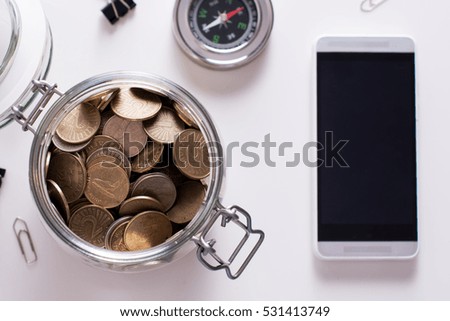 Jar of coins. Saving concept 