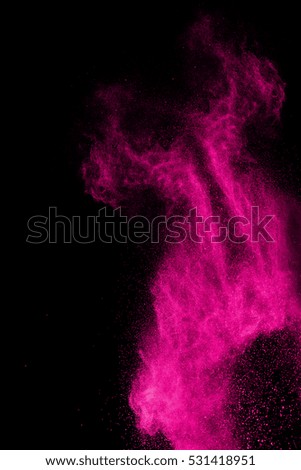 abstract powder splatted background,Freeze motion of color powder exploding/throwing color powder, multicolored glitter texture on black background.