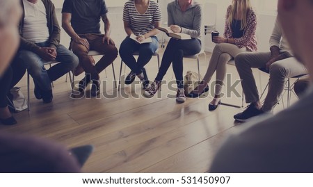 People sitting in a circle counseling Royalty-Free Stock Photo #531450907