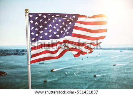 US flag against harbour