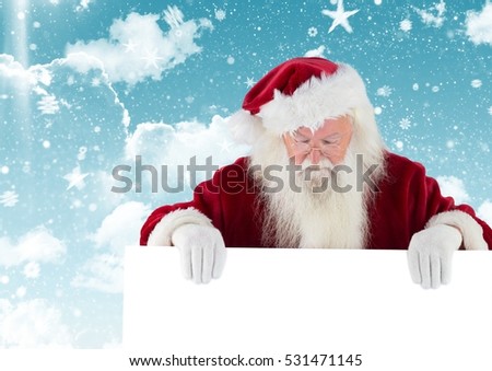 Santa claus looking down at white placard against digitally generated christmas background