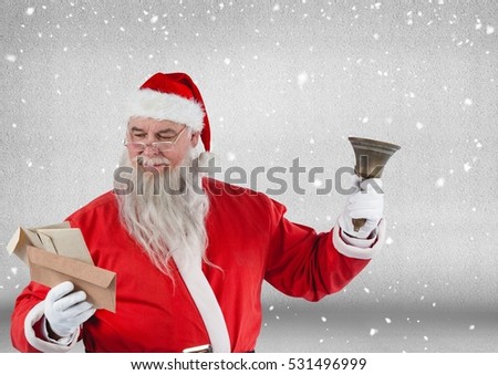 Santa holding bell and reading christmas letters against digitally generated snowy background