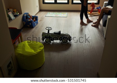 grey toy racing car isolated on a room background