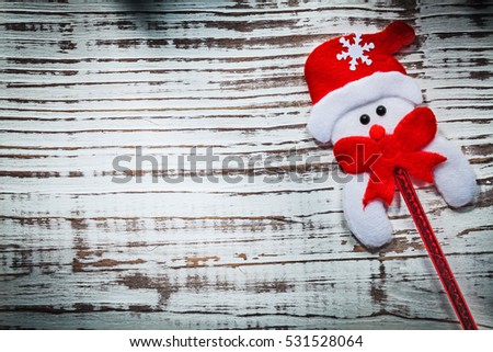 Father Xmas decoration on vintage wooden board holidays concept.