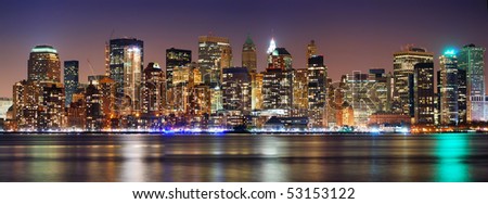 New York City night panorama with Manhattan Skyline over Hudson River with reflection.