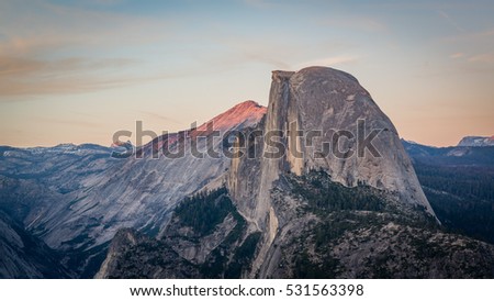 Sunset over the Half Dome, taken from Glacier Point, Yosemite National Park, California, USA Royalty-Free Stock Photo #531563398