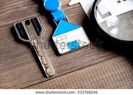 concept of buying house on wooden background close up