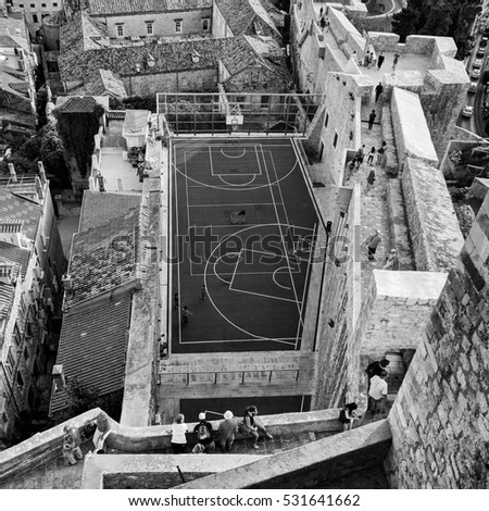 Basket ball Black&white rooftop view DubrovnikÂ is a Croatian city on the Adriatic Sea, in the region of Dalmatia. It is one of the most prominent touristÂ 
