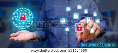 Cyber security network concept, Young asian man holding global network security and pressing lock icon with virtual screen. Royalty-Free Stock Photo #531654580
