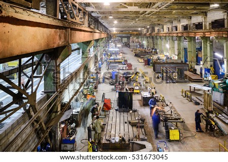 Industrial, workshop for production of handling removable devices. View from the ceiling. Royalty-Free Stock Photo #531673045