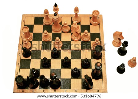 Abstract composition of chess figures. Isolated on white background.