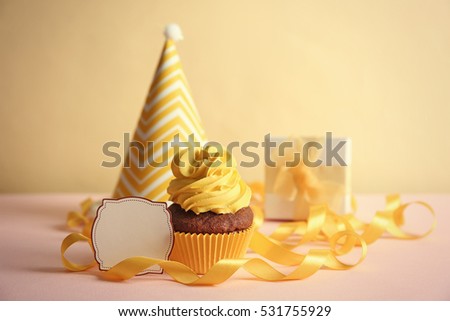 Birthday cupcake with space for text on light background