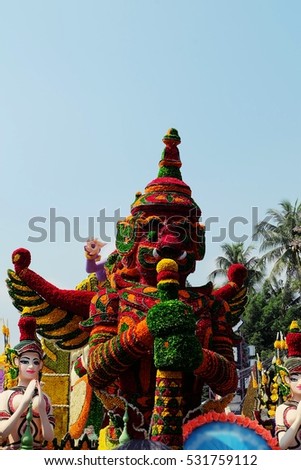 Thai style giant statue made from flower