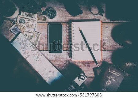 Overhead view of Traveler's accessories, Essential vacation items, Travel concept background, vintage background, love story, selective focus
