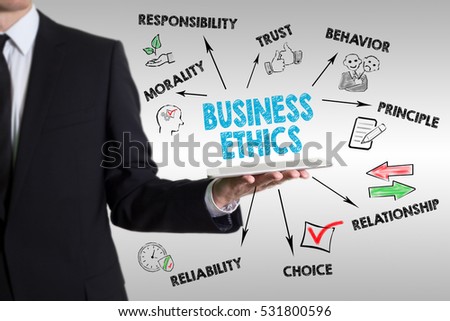 Business Ethics concept with young man holding a tablet computer