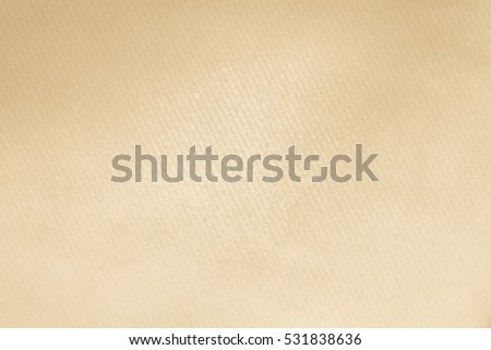 Recycled craft paper background in old light white yellow cream color tone vintage retro: Detailed texture of kraft paper fiber in pastel toned style.Simple plain abstract textured for wallpaper.

