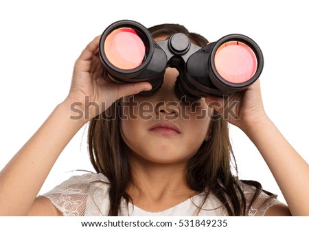 chinese little girl looking trough the binoculars
