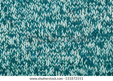 Knitted fabric textured background. Screen saver on your desktop or laptop