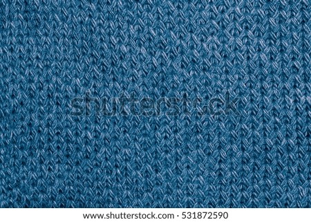 Knitted fabric textured background. Screen saver on your desktop or laptop
