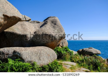 The pink granite,Rock with strange shapes, coast in brittany. The mass of enormous pink rocks 

The pink granite,Rock with strange shapes, coast in brittany. Royalty-Free Stock Photo #531890269