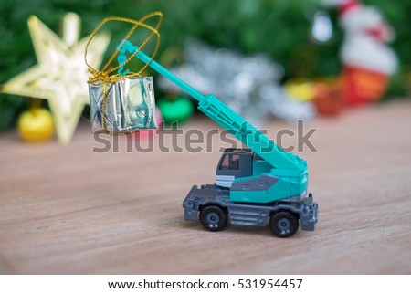 Christmas decoration. Truck car carries decorations for Christmas trees