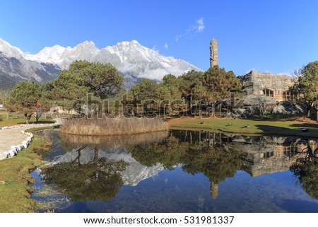 Chinese landscape with the Jade Dragon Snow Mountain in Yunnan on background