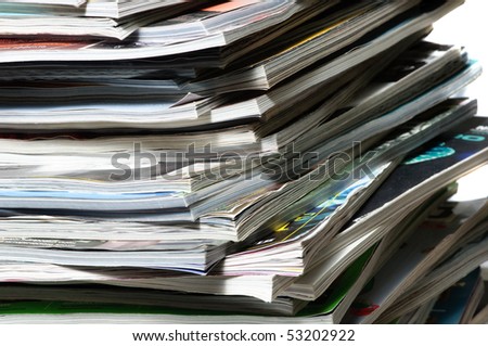 Stack of magazines . Close - up.