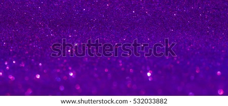 defocused lights background. purple glitter