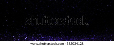 defocused lights bokeh background. purple glitter