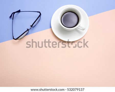 Top view of colorful cup of coffee and glasses  on color  background for create idea for business or design .Relax coffee time (flat lay)