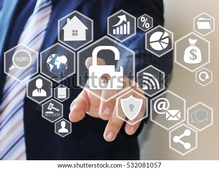 Businessman pushing icon of security shield business from viruses on the Internet on the touch screen in the web network . 