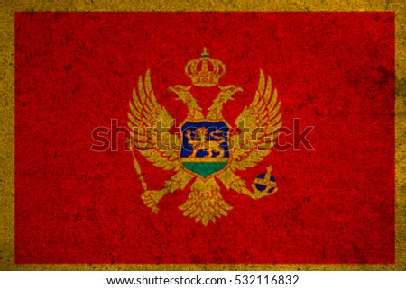 montenegro flag on an old grunge background