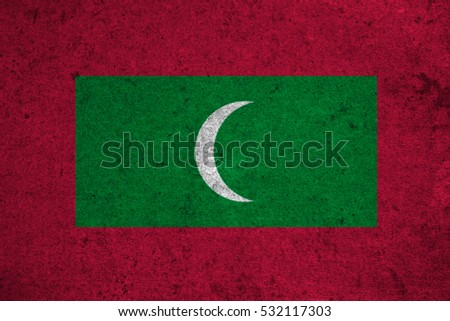 maldives flag on an old grunge background