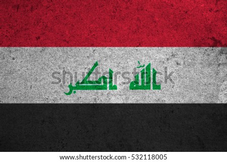 iraq flag on an old grunge background