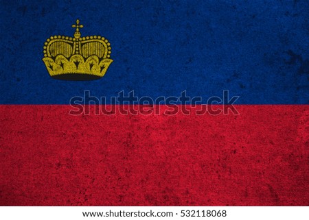 Liechtenstein flag on an old grunge background