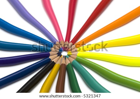 abstract colored pencils in a round close up
